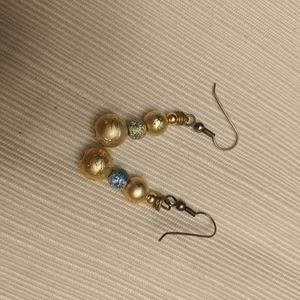 gold and silver dangle earrings